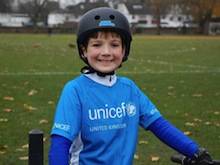 Photo of a boy on a bicycl